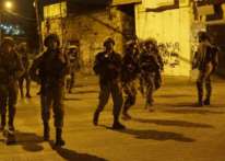 نابلس: إصابة طفل بالرصاص الحي وحالات اختناق باعتداء الاحتلال على قرية برقة