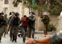 الاحتلال يعتقل 14 مواطناً في مناطق متفرقة بالضفة الغربية