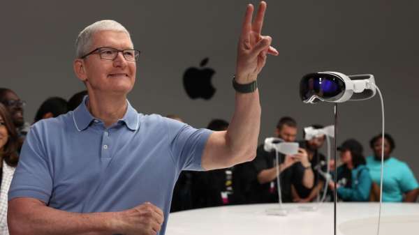 Apple CEO Tim Cook poses with glasses 
