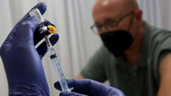 Person holding injection