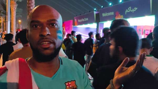 An upset fan outside a fan zone