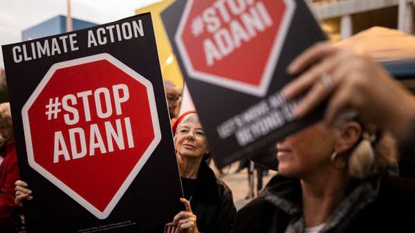 Adani protesters are seen in Brisbane Square on July 5, 2019 in Brisbane, Australia. The protesters are calling on the Queensland State Government to withdraw its approval of the Adani coal mine in central Queensland.